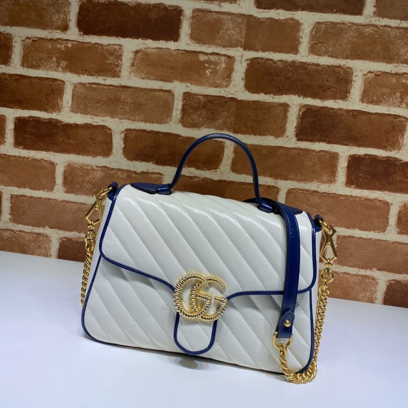 G*u*i top handle bags